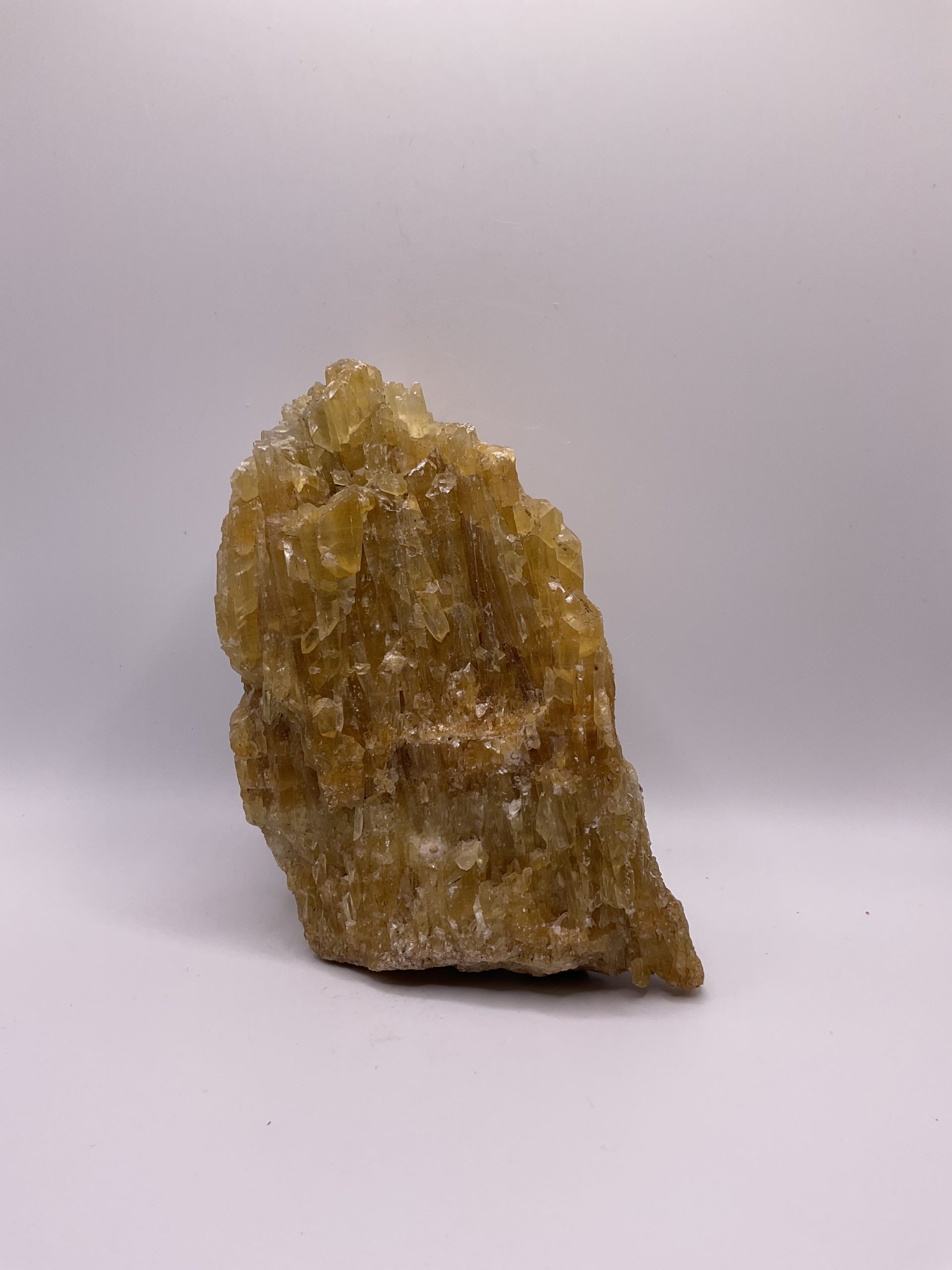 Raw amber yellow calcite